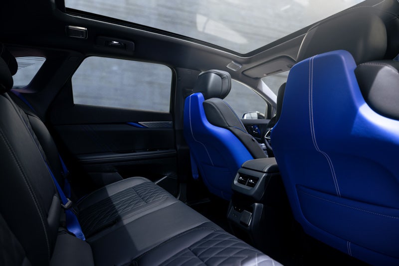 Back Seat View of the 2026 OPTIQ-V Blue Front Seats, Sun Roof, and Interior | Coughlin Cadillac Circleville in Circleville OH